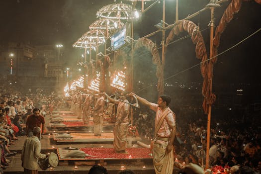 Experience the vibrant Ganga Aarti ritual on the ghats of Varanasi, India, capturing tradition and spirituality.